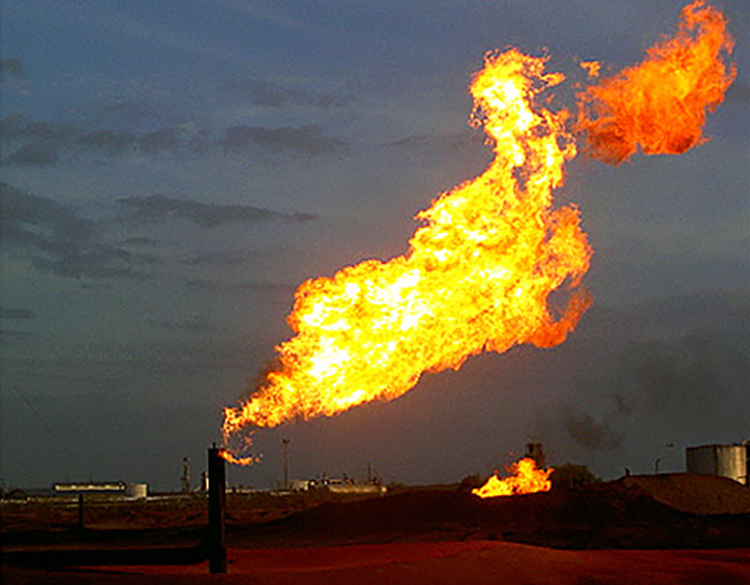 Photo of natural gas fire by Tod Baker for an article by the Rio Grande Sierra Club about oil and gas risks in New Mexico